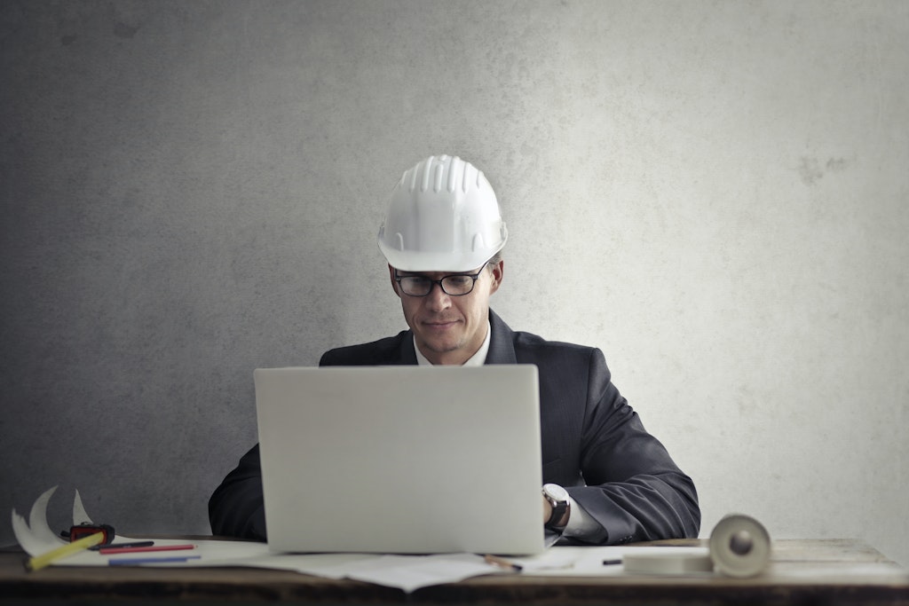Man with a white hard hat