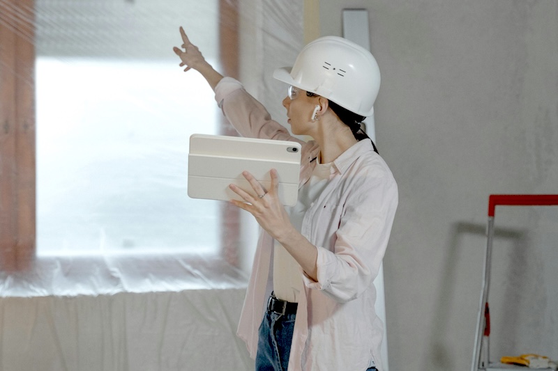 Woman following O&M manual